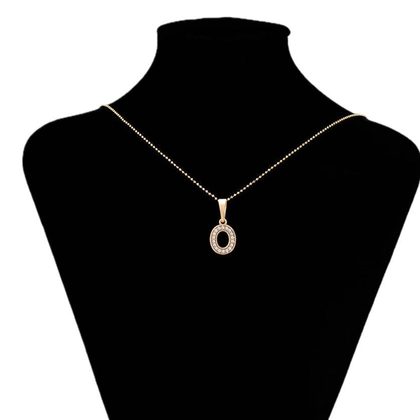 Gold necklace with a pendant on a black mannequin bust, branded 'Xuping'.